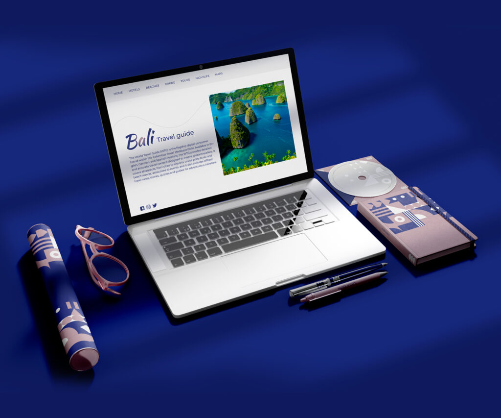 Travel branding mockup featuring a Bali travel guide website on a laptop with promotional materials and stationery accessories.