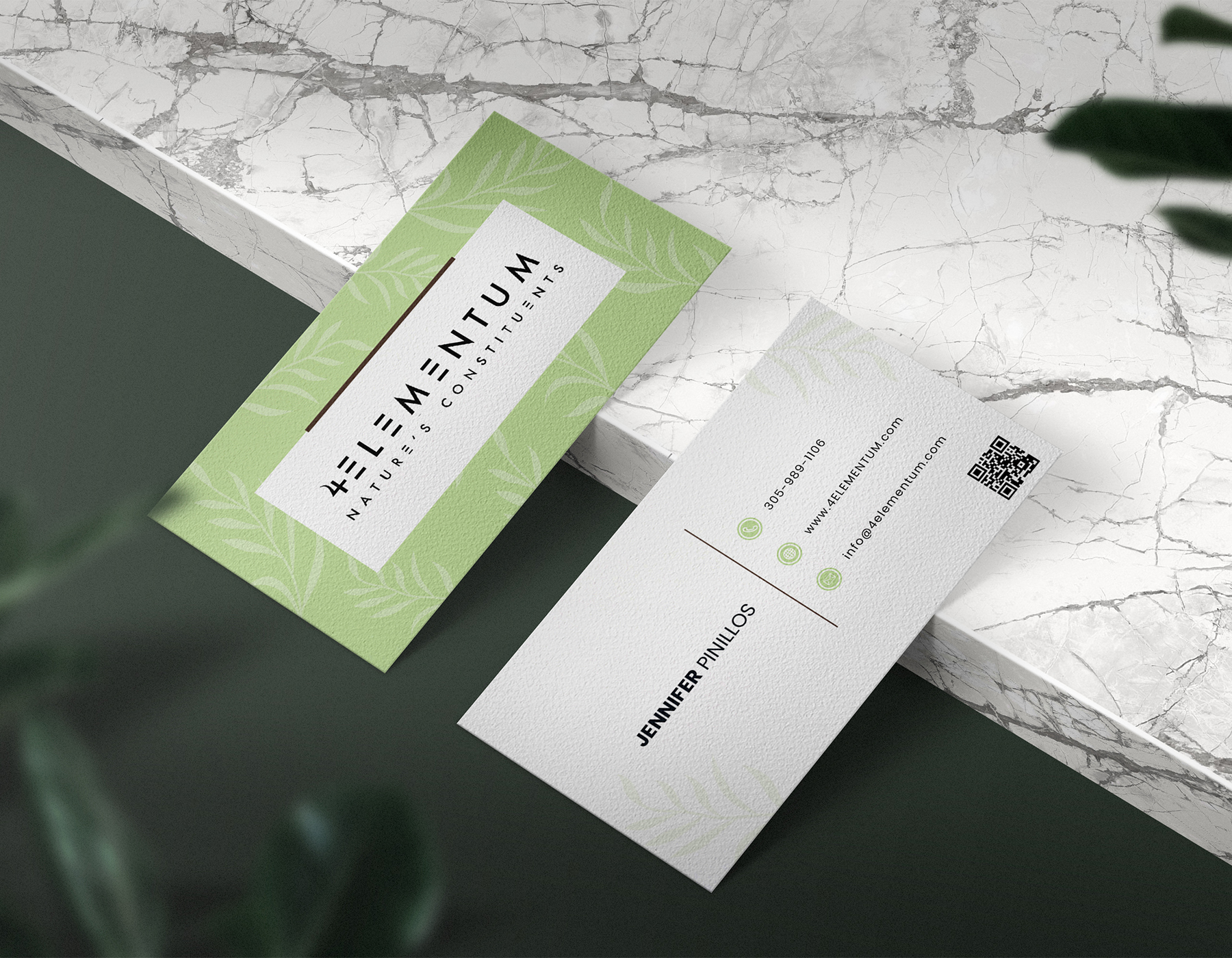 Eco-friendly business card mockup featuring green botanical branding, QR code, and minimalist natural wellness identity design.