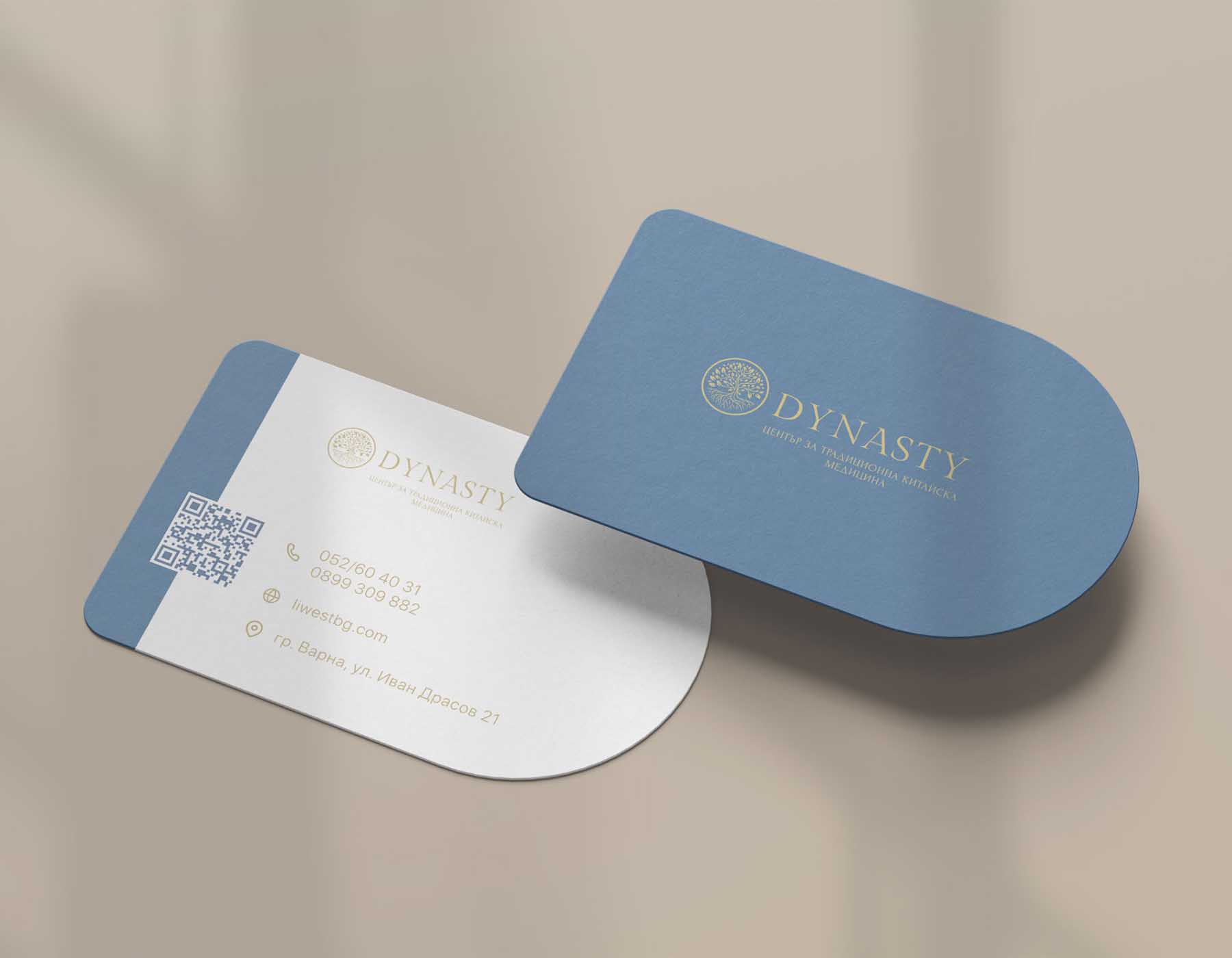 Blue and white rounded business card mockup featuring luxury branding, QR code, and elegant corporate identity design.