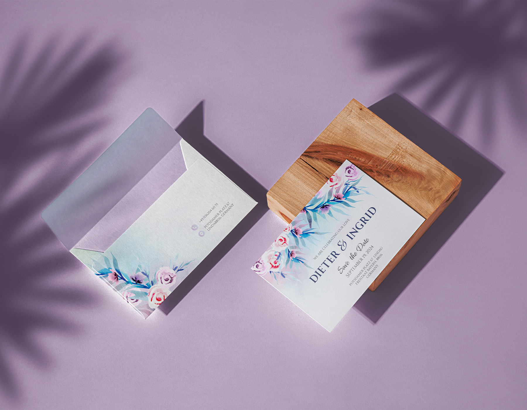 Elegant floral wedding invitation card and envelope mockup.