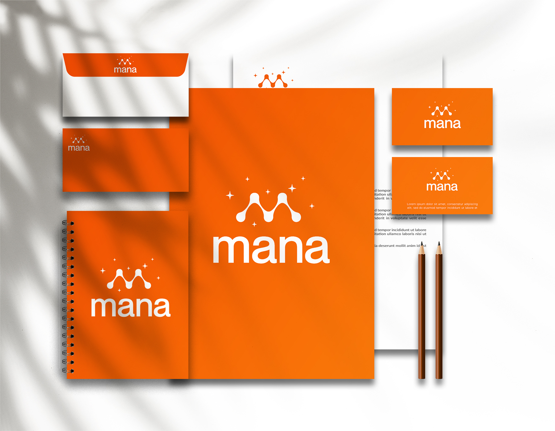 Turquoise branded notebook, business card, pen, and door hanger mockup on a bright yellow background.