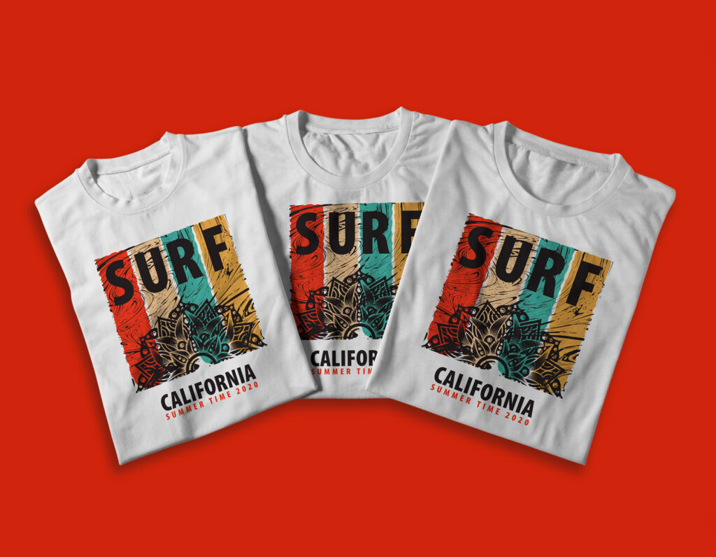 Three white t-shirts featuring a colorful Surf California graphic design displayed on a red background.
